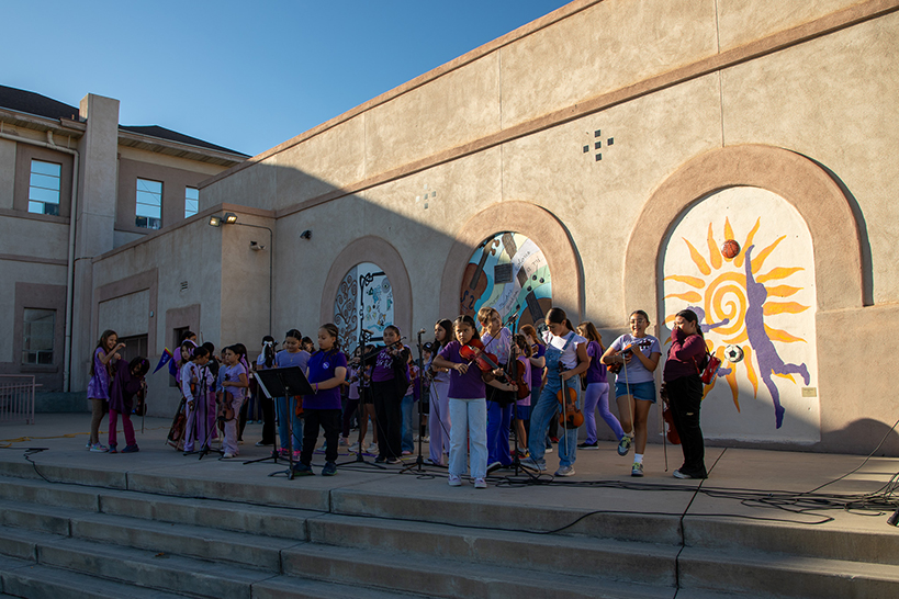 Students perform on the outdoor stage