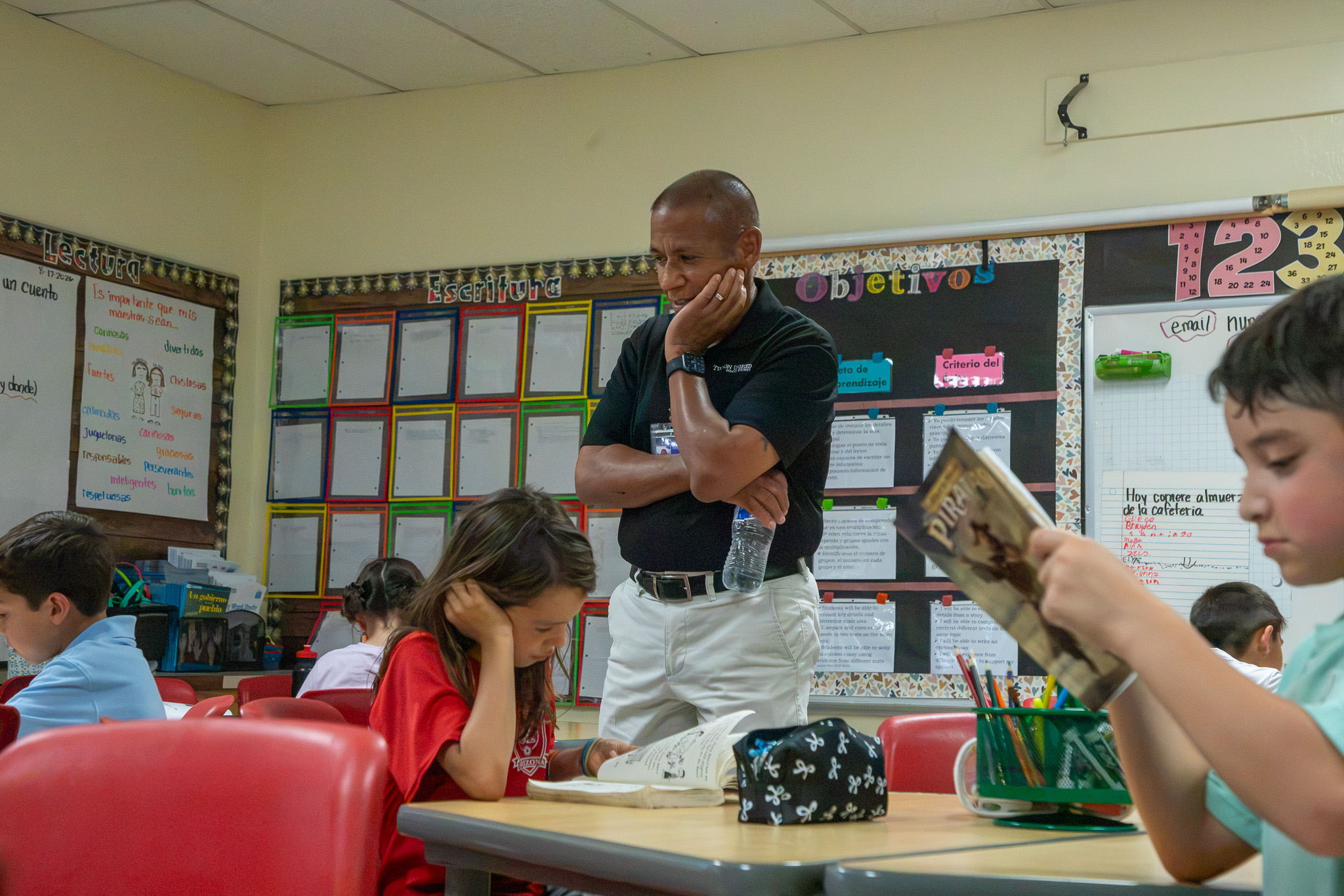 Dr. Trujillo watches students work on their assignments
