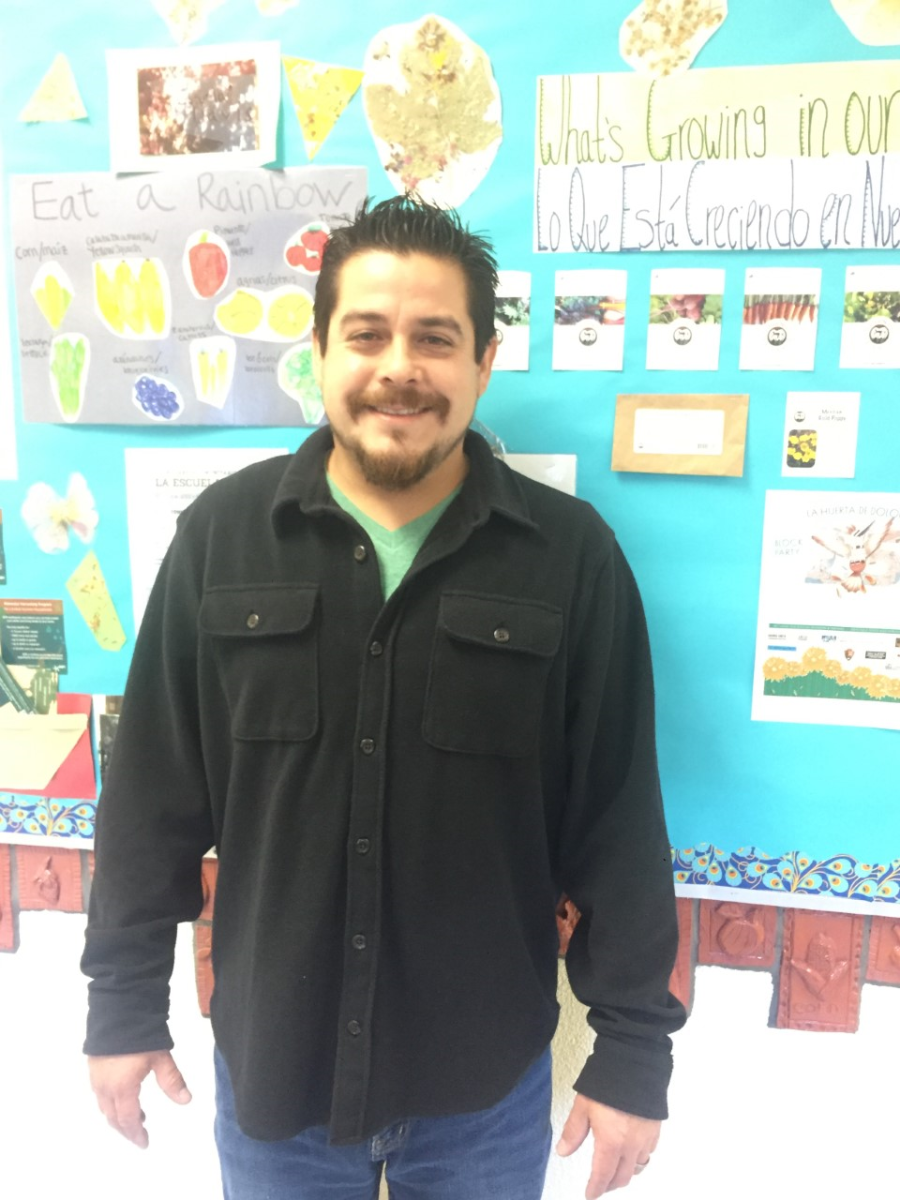 Joshua Chuc, GATE Teacher smiling in a classroom